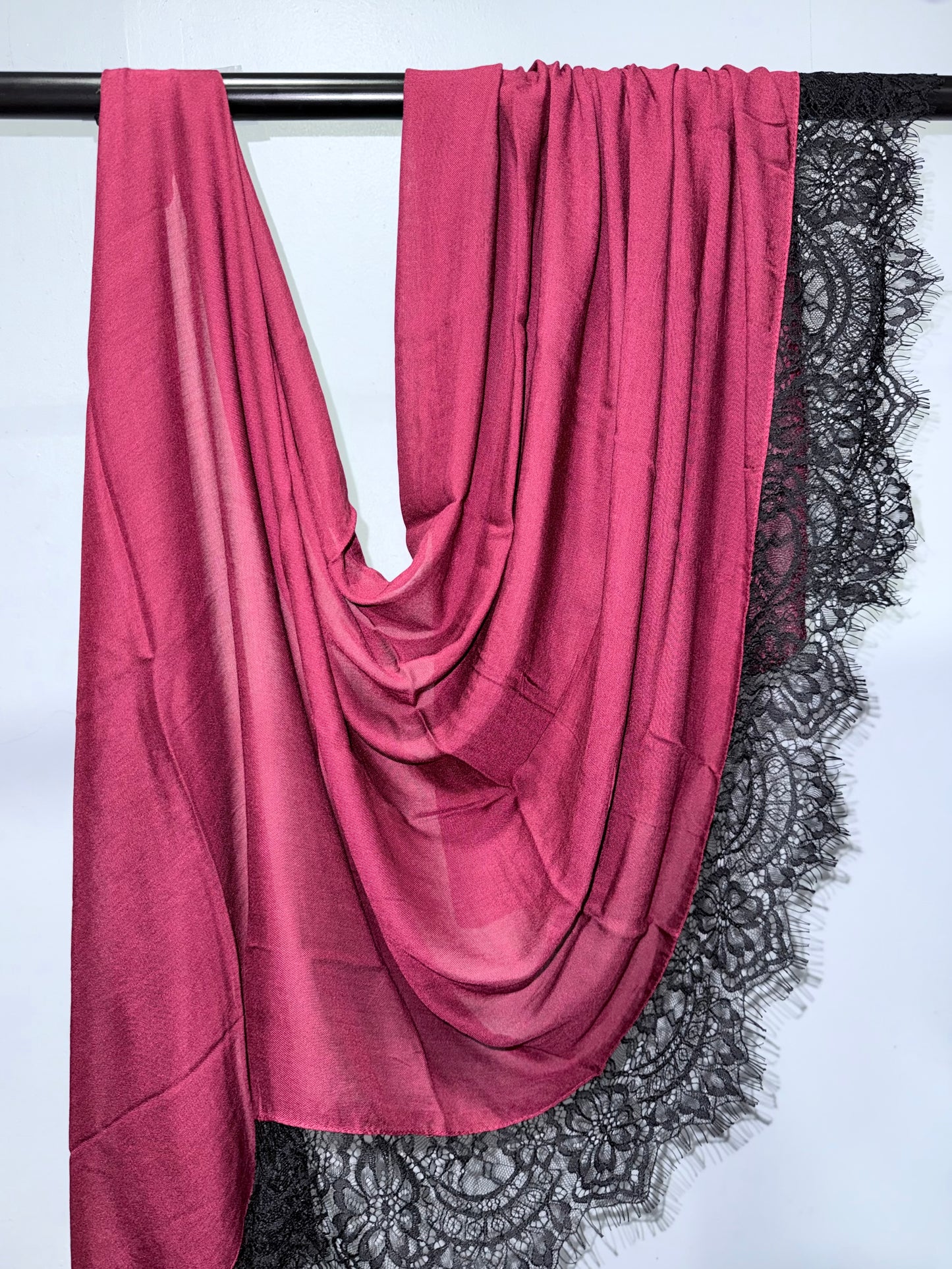 red modal with black lace hijab